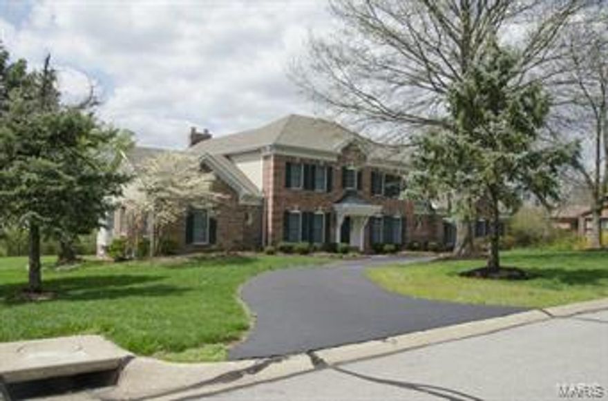 Fabulous 1.5 story 4bd  4.5 ba home with over 4,000 sq ft. on an acre lot in desirable T&C. Marble  entry foyer opens to Dinning Rm and Music Rm with crown/ dentil molding. The newer wood flooring throughout main floor and upstairs is gorgeous! The 28 x 17 Great Rm features faulted ceiling, wet bar, impressive brick fireplace.  Beautiful updated kitchen complete with 42'' cabinets, granite counters, custom backsplash, heated ceramic flooring and a bay window. 4 Season Rm overlooks peaceful woods and an amazing lake view. Huge deck. The Lg Master Ste has coffered ceilings, walkin closet & newly updated luxury bath with a Jacuzzi tub, sep shower, bay window & dbl sinks. Newer remodeled  w/o lower level is finished with a huge rec room,  full bar, fireplace, den, sitting area & still plenty of room left for storage. Home Warranty offered. Other features include fresh paint, bathrm floors, siding/soffits/faschia zoned hvac, the list goes. A true must see and a perfect place to call home! Additional Rooms: Sun Room