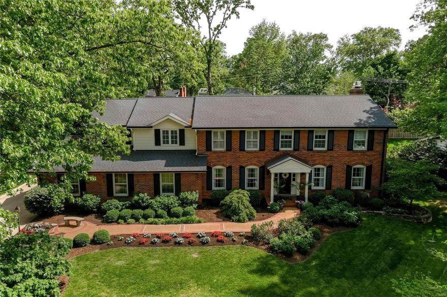 Gorgeous 5000+ sq ft home has been renovated and expanded to accommodate a buyer's busy lifestyle.  Open floorplan offers new wood flooring throughout entire 1st flr, private dining and formal living rm, open kitchen hearth rm with Thermador, Danby marble, custom cabinetry and center island making this truly the heart of the home.  Another family rm with wetbar, wainscoting and handsome built ins provides more space to spread out.  An office, updated powder rm, mudrm and family entry hall completes this flr.  Up the back staircase, find a large master suite with walkin in closet and marble spa bath (Ann Sacks tile), 4 lg bedrms and 2 lg custom full baths (Waterworks), and laundry rm.  More finished space is found in the lookout lower lev.  A 4 season porch with brick fp and beamed ceiling provides more outdoor living space into the large yard.  Updates also include:  alarm sys, sprinkler sys, AV systems, 2nd flr HVAC, landscaping, and more.  Idyllic neighborhood, Reed ele, walk to OWCC Additional Rooms: Mud Room