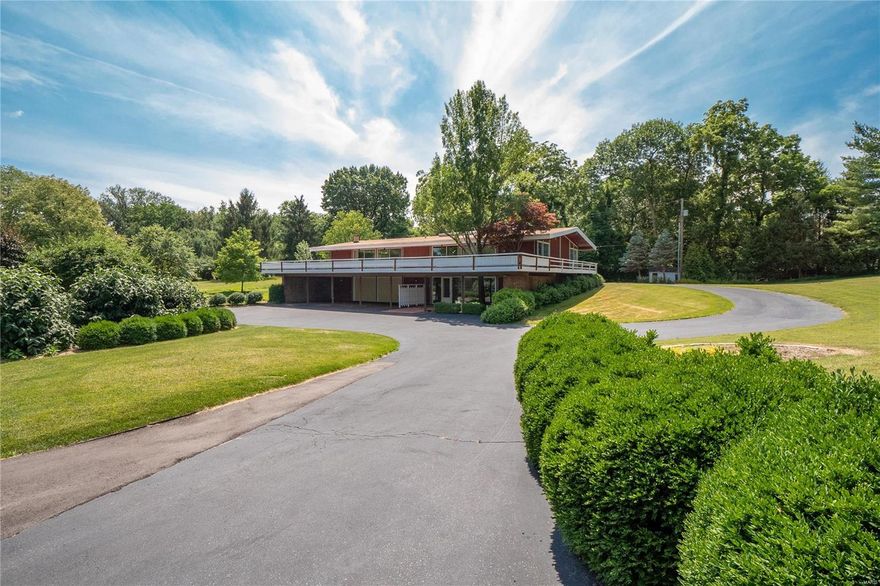 A Rare Gem. Let your best life begin! This amazing Gyo Obata unique and unexpected contemporary home is stunning. Enjoy your morning coffee on the expansive deck overlooking the golf course and beautiful vistas. Spacious floor plan, open atrium, sunlit rooms, 4 bedrooms, & 4.5 baths sitting on 1.8 prime acres in heart of Ladue located on Old Warson Country Club Grounds. Bring your creative design and turn your vision into reality. This desirable property offers privacy and serenity with mature landscaping. OR This  Fabulous level 1.8 acre property overlooking the golf course makes for the perfect setting for your dream home.