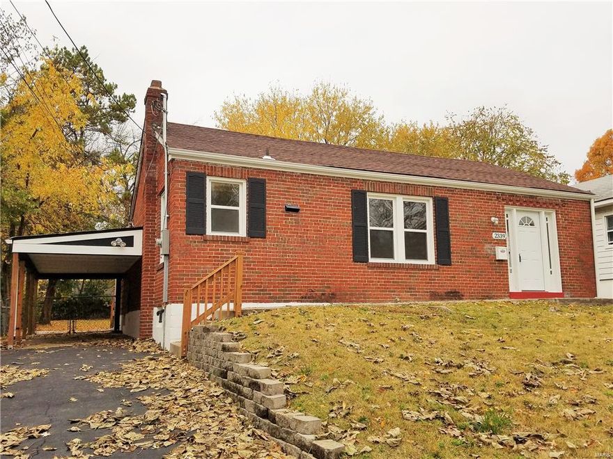 RENOVATED! Plus renovations on 2337 Wallis, the home next door, to begin this Spring! Full brick front with deep carport and side entrance. Step into freshly finished hardwood floors, new carpet in the hall, back family room & back bedroom.  Great room & dining area has lots of windows & is open to the kitchen which boasts new gas stove w/new hood, refrigerator plus a pantry.  Both bathrooms have been remodeled & have tub/showers, new commodes, sinks & tile flooring.  Enjoy the extra space with the separate family room with ceiling fan that flows into the backyard from the rear deck. Nice deep lot with mature trees in the back.  Lower level has new furnace, water heater, main electrical panel, new window , new plumbing, new roof & new AC.  Home is move-in ready with fresh paint, new doors & lighting.  Must see today!