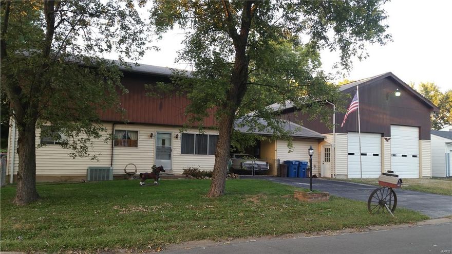 This fixer upper has great bones & space! The possibilities are endless for the handyman, do it your selfer & rehabber! Great Pattonville School Location! This 2 story, 5 bdrm. home has lots of room for family & friends on a nice quiet tree lined street. Most of the main level features original hardwood flooring. All shown appliances stay in vinyl floored eat-in kitchen. If you don't use the 2 main level bedrooms they would be perfect for office & den space. Upstairs bedrooms are all nice sized with a huge master bedroom. Featuring a 42 ft. deep garage space divided into two 12 foot bays that includes 17 ft. ceilings. Perfect for Boat or RV storage or just the place to work on cars, crafts, & furniture. Included in this garage is the workshop with an additional 20 by 15 ft. of work area for tools & machines!!! A covered porch directly behind the home & garage overlooks the level, fenced yard & storage shed. This property is being sold "AS IS" Seller to make "NO REPAIRS"