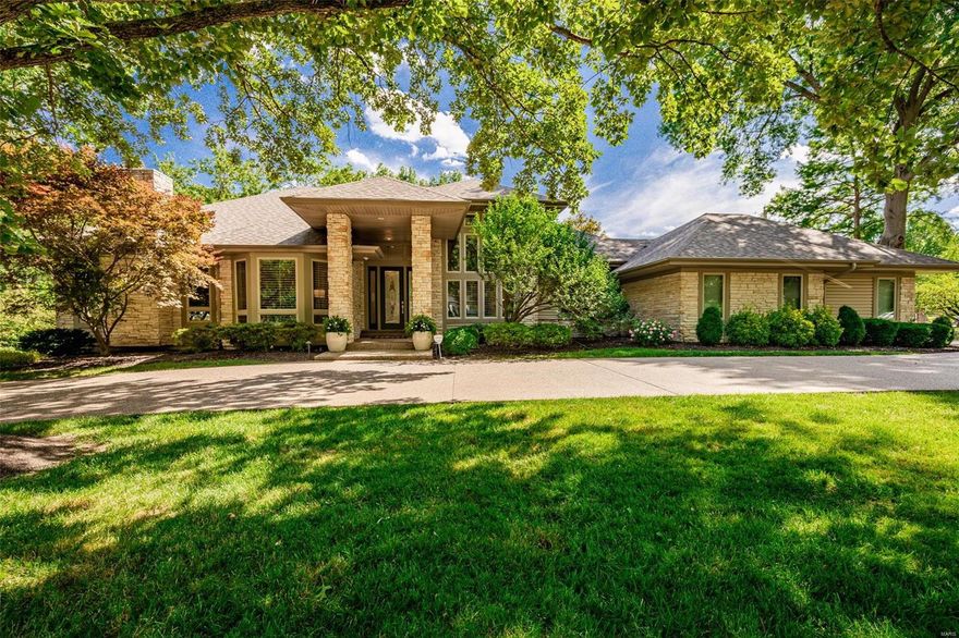 Welcome to this SPECTACULAR reverse ranch style home, perfect for today's lifestyle. Expect to be WOWed from the minute you drive up to this 6000+ sq ft home. Upon entering you will find 12" ceilings, large office, gorgeous dining room, & incredible kitchen with large breakfast bar & center island, breakfast room opens to composite deck, great room with beautiful gas fireplace, wet-bar. Surround sound throughout. Main floor primary suite features gas fireplace, his/her walk-in closets, luxury master bath with jet tub & separate shower. Mud room, laundry room, & 2 baths round out expansive main floor. Walk out lower level (above grade) boasts hardwood floors, movie screen, workout room with new full bath, gorgeous bar with ice maker, wine cooler, dishwasher. 3 bedrooms 1 on-suite, & 1 jack-n-Jill. Additional laundry room & plenty of storage. Enjoy your days on lovely covered patio, INCREDIBLE 20x40 pool, hot tub, and fire-pit (new 2020). Private yard backs to Des Peres park.3 car garage Additional Rooms: Mud Room