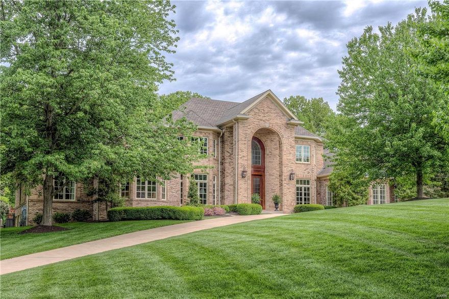 Spectacular 1.5-sty Estate home on 1-acre grounds! Grand 2-sty marble foyer leads to library-paneled study with built-in bookcases & gallery landing, elegant dining room & step-down great room with architectural ceiling, marble fireplace & artisan glass doors that open to light-filled sunroom. Designer kitchen with granite countertops, custom cherry cabinetry, professional quality appliances, center island & butler’s pantry adjoins breakfast room with octagonal ceiling & atrium door to patio. Coffered master bedroom suite is a haven of luxury with huge walk-in closet, cast stone fireplace, beautifully appointed bath with domed ceiling & Jacuzzi and private study with custom built-ins. The 2nd floor extends the living quarters with 3 additional bedroom suites. Incredible Lower Level includes recreation room with fireplace, family room, media room, workout room, gathering bar, wine cellar & full bath. Professionally landscaped lot with patio, heated pool, woodlands garden & 4-car garage. Additional Rooms: Sun Room