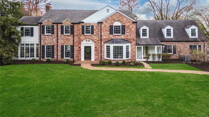 Welcome to this stunning, sophisticated home located on one of STL's premier & sought-after streets. This washed brick home boasts incredible curb appeal & timeless elegance. Step inside & be greeted by a grand foyer featuring an eye-catching staircase that sets the tone! The expansive dining rm & the inviting living rm are perfect for entertaining. The bright kitchen & breakfast rm opens to the main floor family rm, creating an ideal space for everyday living. A charming 4-seasons rm & a cozy den w/ built-ins adds even more character. Upstairs, there is a pleasant primary suite, 3 generous bedrooms, 2 full baths & a loft for the kids make this home ideal for families. The finished LL includes a family rm &  4th full bath for convenience. Step outside into the delightful backyard, where privacy meets luxury. Enjoy the pool, beautiful patio & tennis court, perfect for outdoor entertaining or simply relaxing in your own oasis . This exquisite home offers unparalleled charm & privacy. Additional Rooms: Sun Room