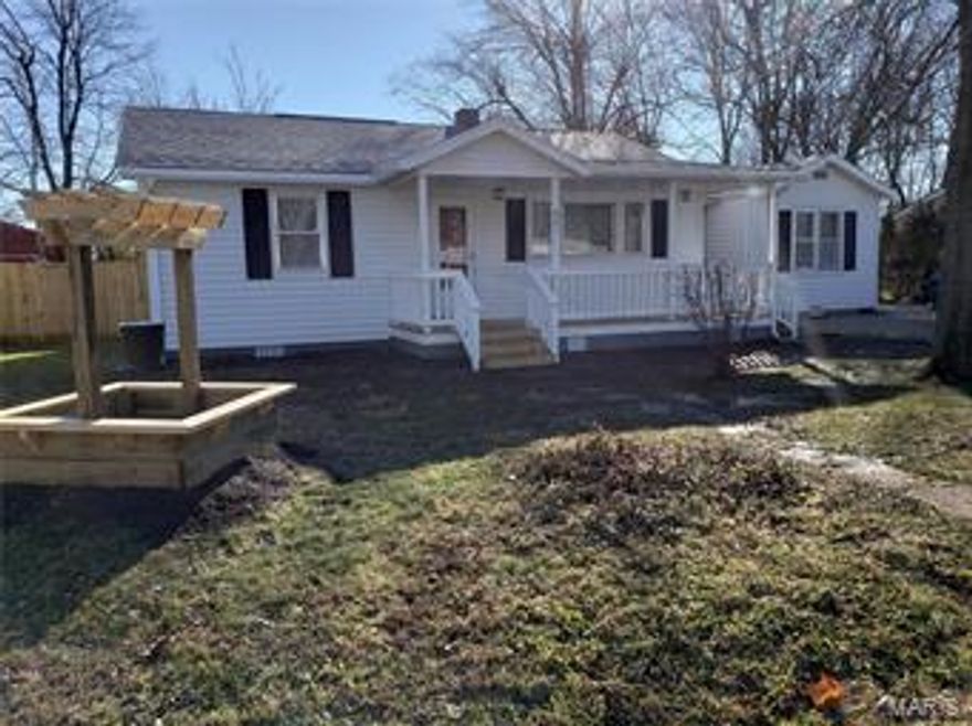 What's old is NEW again!!  Oh my gosh you have got to see this beauty! There are so many amazing features to this adorable home! NEW paint, NEW 18"x 18" ceramic tile in both bathrooms, kitchen/eat in kitchen and laundry room, NEW kitchen cabinets, NEW kitchen granite counter tops, NEW Stainless Steel  Whirlpool Appliances, NEW 1/2 horsepower garbage disposal, NEW island with NEW stainless steel sink, NEW LED lighting throughout, NEW scraped wood laminate in Master Bedroom, all NEW master bathroom, (didn't exist before remodel!), NEW 4'x 6' master Walk in closet. In the guest bathroom NEW tile, flooring, sink, stool, cabinets and medicine cabinet, NEW HVAC with high efficiency heat pump, NEW electric water heater, NEW covered front porch, NEW deck, NEW partial privacy fence, NEW storage building, NEW 1" clean chat in driveway, NEW shingles, and so much more!  BUT.... among all this NEWness the original hardwood floors remain in living room and 2 bedrooms!!!