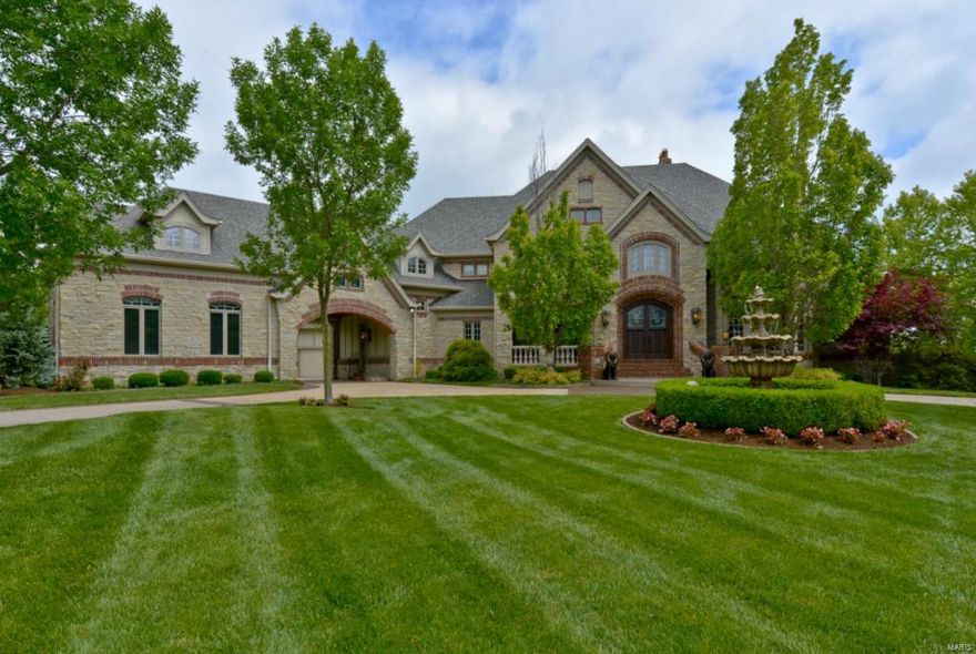 This 7 bed, 9 bath estate w/nearly 10,000 square feet truly defines luxury living at its finest! It sits on 3 pristine acres w/5 car garage, porte cochere & circle drive. Den w/custom millwork & marble FP. Formal DR w/arched entry, custom millwork & coffered ceiling. 2 story GR dons wall of windows, custom flr inlays & stone/marble fireplace w/Venetian inlays that make a breathtaking gathering place! Gourmet kitchen features custom cabinets, granite, expansive island, planning desk, wide plank cherry wood floors, Viking appl incl. 6 burner gas range. Wet bar has a Viking ice maker. Hearth room has coffered ceiling & brk/stone/marble FP. Opens onto deck overlooking salt water swimming pool & outdoor entertaining area. Main floor master suite has wall of windows overlooking backyard oasis, custom closets, lux bath w/marble/granite, whirlpool tub & walk through shower. UL has 4 beds & 4 full baths. LL has FR, Rec Room,in-laws suite & kitchenette. Other:nanny's quarters & so MUCH MORE!