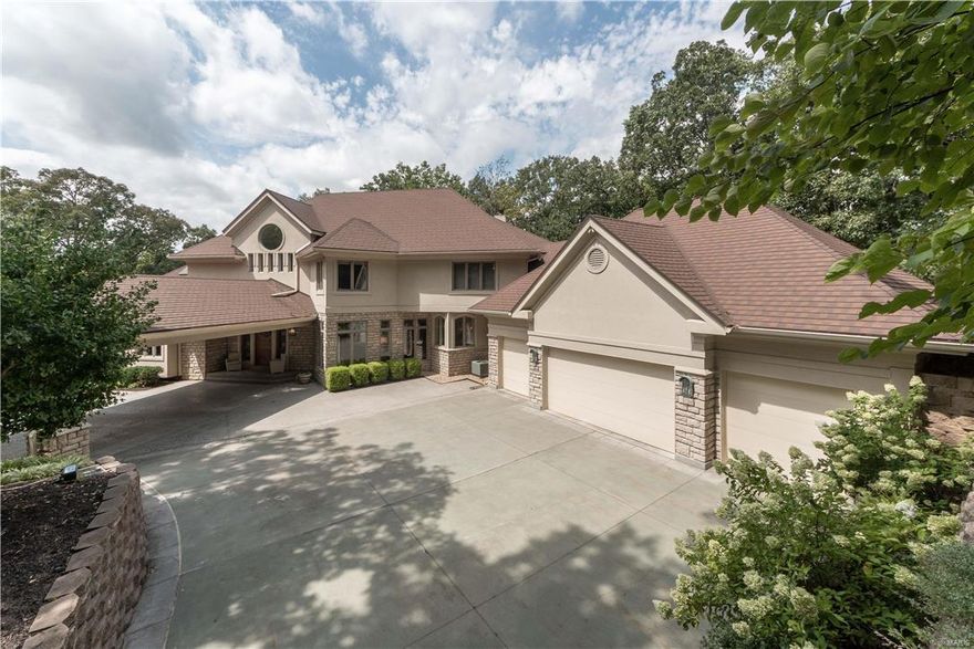 Are you ready to escape to this beautiful secluded estate? Nestled on 1.5 acres, this home is a must see! It is designed for entertaining with a grand entrance when you walk into the home. The large eat-in Kitchen is complete with a generous center island breakfast bar. Adjoining the Kitchen is a cozy Hearth Room where you can sip your morning coffee next to the fire. When it comes to the Master Bedroom, if you are looking for breathtaking views from your own private patio you will not be disappointed. You'll never want to leave this gorgeous home with classic contemporary architecture.
New HVAC units installed in February, 92% 16 seer (Info in Supplements). Transferable 50 year warranty on the roof. Kitchen updates being done, including new counter tops and cabinets. Work to be completed by October 2017