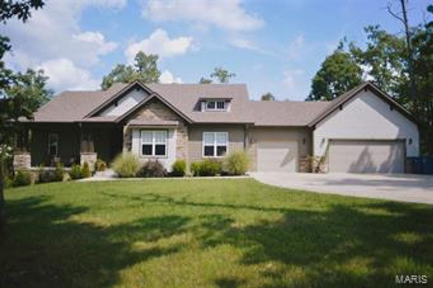 Beautiful home in Timberlake Trail Subdivision. Home features granite countertops, stainless appliances, hardwood flooring, tile shower, whirlpool bath, and Full walk-out basement.