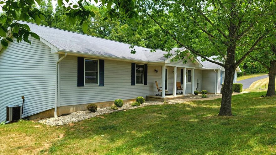 Sitting Pretty and Waiting for New Owners! You'll be pleased with this ranch-style with vinyl siding. Step inside and be amazed at the easy flowing open concept.  Soaring vaulted ceiling highlight the spacious living room that flows easily into dining area.  Kitchen comes with plenty of custom cabinets, breakfast bar, stainless appliances including refrigerator.  Dining walks out to beautiful deck overlooking back yard which backs to trees for privacy.  Back inside and down the hallway are the master suite w/full bath, 2 roomy additional bedrooms and second full bath.  Downstairs to the finished basement and off to the right enjoy BIG family/rec room, great place for hanging out and entertaining, third full bath.  Off to the left side of the stairs you'll find the laundry neatly tucked away, and 4th bedroom with egress window. All of this and more sit nicely on just under 2 acres.  Oversized, 2-car side entry garage. Also includes a invisible pet fence (No Collars).