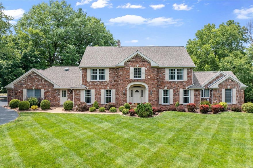 Stately home on a premier 1 acre lot overlooking beautiful Queeny Park. Home features a traditional 2-story foyer, formal dining room, paneled office w/built-ins, a spacious great room w/ the cathedral ceiling, floor-to-ceiling fireplace & palladium windows invite the outdoors in w/ spectacular views. The state-of-the art kitchen with numerous maple cabinets, granite counters, center island &Dacor appliances is a chef's delight. The light-filled breakfast room & vaulted hearth room will be a focal point for the family. The Master suite offers a luxurious bath w/ jetted tub, separate shower & a private deck. The 2nd floor features 3 add'l bedrooms: one w/ ensuite bath. The remaining 2 share a Jack 'n Jill bath. A loft provides add'l living space. The walkout LL features a family room, fireplace  & 2 add'l bedrooms & bath.  The deck and gazebo are perfect place  to enjoy the views of the park. All this plus a 3-car garage. Queeny Park is just a few steps away.