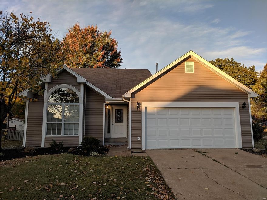 Stylish design 1.5 story with corner lot; Wow - Brand new maintenance free vinyl siding.  New deck. New privacy fence. New furnace. Brand new carpet and LVT flooring throughout.  Open floor plan - vaulted ceilings- fireplace - bay windows - updated kitchen.  Main floor master bedroom with walk-in closet, dual sinks, jetted tub with separate shower. Full finish basement with recreation family room, office guest rooms and bath. Main floor laundry. 2 car garage.