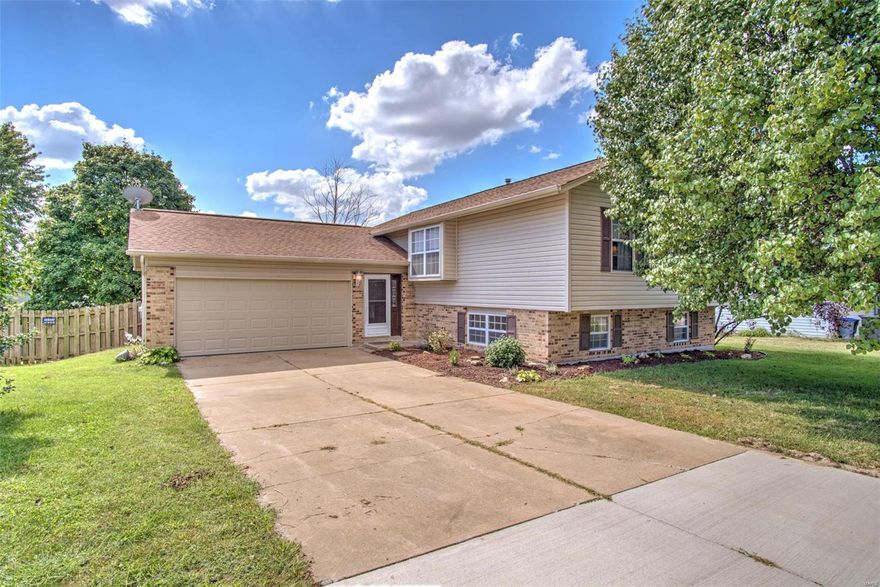 Beautiful turn key home! Lots of recent exterior updates including: siding, garage door, slider doors, energy efficient windows, 2.5 ton A coil & furnace. -- Inside the kitchen/dining area features: new beautiful mocha cabinets, new Santa Cecilia granite countertops, updated stainless steel appliances (built in micro, dishwasher & smooth top stove) -- There are plant shelves to show off your décor & a vaulted ceiling in the great room. -- Other interior recent updates include: lighting - fresh paint - plank flooring in foyer, great room, dining room, kitchen & hallway - frieze carpet in the entire basement & 2 main floor bedrooms. There is a large master bedroom with dual closets. Luxury bath on the main floor w/ double bowl sink, soaking tub & a shower. Professionally finished lower level with huge rec room, full bath, 2 more bedrooms, & plenty of room for storage. Enjoy BBQs on the covered patio & deck - fenced yard. Fantastic location with all O'Fallon has to offer! Subdivision pool
