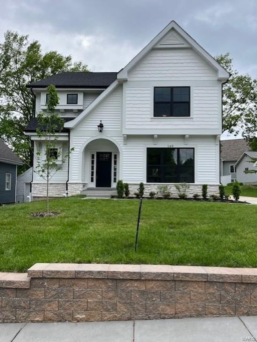 Experience luxury living in this stunning new construction 2-story 5 bedroom 3.5 bath home just completed in this highly desirable Webster Groves location just a short walk to downtown. As you enter the home, you'll immediately notice the stunning wood floors.  The large walk-in pantry and dry bar w/wine cooler are sure to impress, as are the stainless steel appliances, gas range, double ovens, direct vent gas fireplace with built in bookcases on each side, custom inset kitchen cabinets, large island, and quartz countertops. Custom millwork includes 7 1/4 inch crown molding on 1st floor, cased openings and windows, and wainscot trim on 1st floor.  The second floor features a spacious laundry room, and master bedroom suite with tray ceiling, 2 walk-in closets, and a heavy glass door on the shower, stand alone tub with built in custom wood medicine cabinets. The FLL features rec room w/vinyl plank flooring, full bath & bedroom. Nice yard to be fully sodded. Additional Rooms: Mud Room