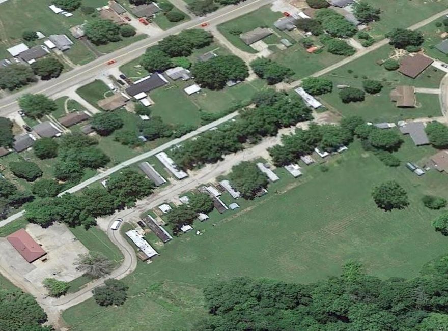 GREAT BUSINESS OPPORTUNITY! Adorable Trailer Park with 25+ units! Fredericktown/Junction City MO- Lots of TLC needed- Located on 5 M/L acres- room for growth- Expenses running approx. $1400 month- on city water and sewer - very good location- Bringing in approximately $2500 a month in profit. Property is being sold As IS! Location: Corner Location