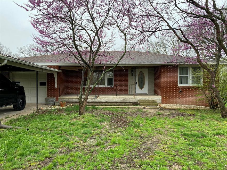 Are you looking for a great home in a convenient location?  This 2 Bedroom, 1 Bathroom, all brick, home is amazing!  Kitchen has new cabinets, granite countertops, and new appliances!  Bathroom has been updated!  Bedrooms are spacious!  Original hardwood floors are BEAUTIFUL!  Den/Office is a great addition!  Yard is huge and made up of two lots!  Detached garage is a great for projects, storage, or garage!  You can access detached garage from the road behind house!   This home has so much to offer!!