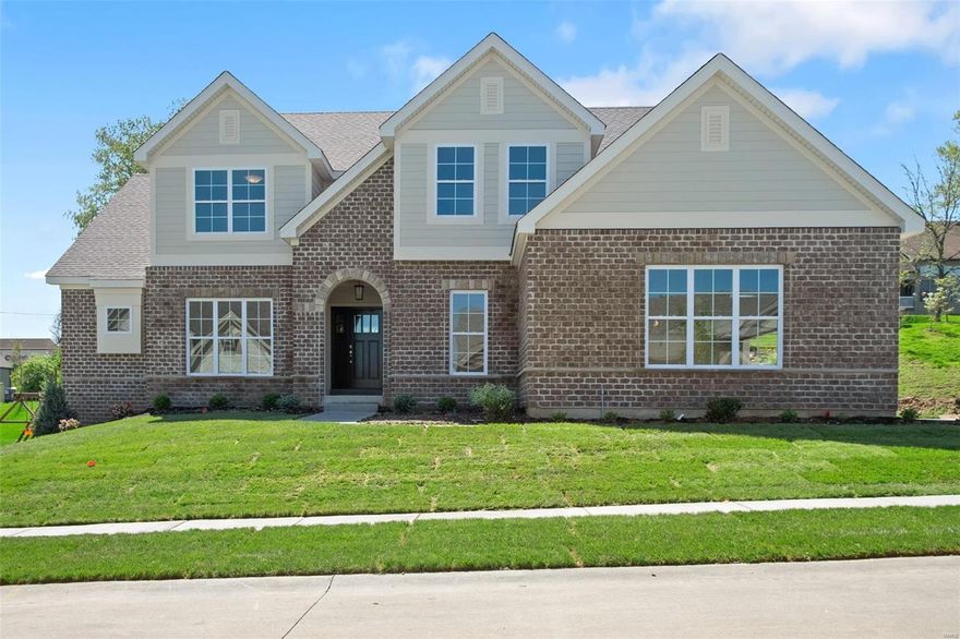 Spectacular 1.5 story by Prestige Custom Homes on a large home site in the Schoettler Grove subdivision. This 4 bedroom, 3.5 bath, home features a 3-car side entry garage, hardwood flooring, gourmet kitchen with custom cabinetry, crown molding, soft close drawers, quartz countertops, Kitchen-Aid stainless steel appliances, under cabinet lighting, & built-in lockers. Soaring VAULTED great room offers a fireplace, wet bar with beverage cooler in breakfast room. Elegant master bath suite boasts coffered ceiling, separate custom walk-in closets, adult height vanities, stand-alone tub, and vaulted ceiling in master bath. Other amenities include an expansive 2nd floor loft and granite vanity tops throughout.