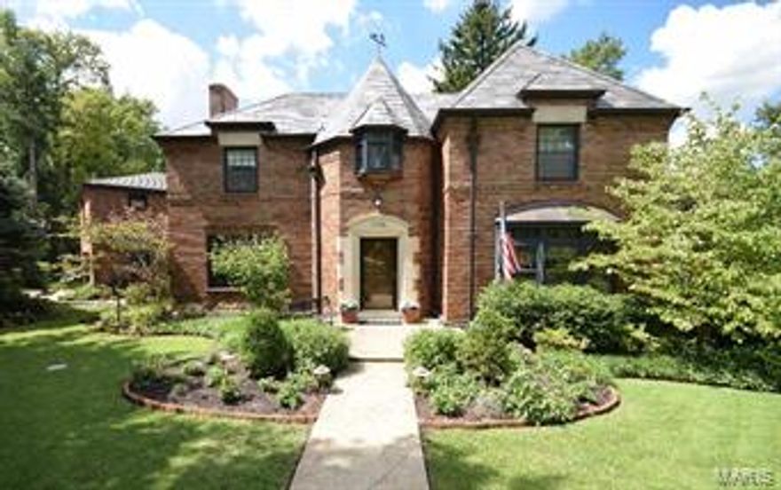 One of the most prestigious homes presented in Davis Place. loaded with luxury updates and charm. Property has a rare carriage house apartment with kitchen, full bath and HVAC. Beautiful brick exterior with slate roof and amazing rear covered walkway. Spacious back yard with a lg. brick side patio. Warm & welcoming foyer flanked by a massive living room with office/study and  large dinning room. Rich hardwood floors throughout. Award winning kitchen w/ Wolf & Sub-zero, cabinet faced appliances where appropriate, lots of smart storage, planning desk and wet bar with drawer freezer/refg. Family/playroom has a convenient laundry pantry and walk-out. 2nd level master suite features a luxury bath and separate shower. Three additional Large bed rooms and a enclosed sunroom. Zoned high eff. HVAC, updated plumbing and electrical, double waters heaters and  sump pumps. Lower level has a vintage bar and additional multi use space w/storage and walk out. Come see this remarkable home. Easy 2 show Additional Rooms: Sun Room