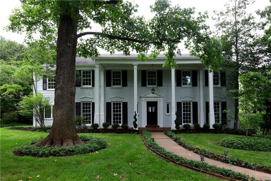 NEW PRICE! OVER $145,000 OFF ORIGINAL. Completely transformed & updated floor plan offers modern flair, while maintaining its charm on a picturesque lane in a premier Ladue neighborhood. Meticulous attention to detail & quality finishes include an Indiana cut limestone FP plus 3 add’l fireplaces, granite & marble kitchen & baths–including Ann Sacks designer mosaics; KitchenAid, Bosch, Wolf appliances w/ Bertazzoni 48” range & Zephyr hood. Open plan with center island kitchen, hearth & breakfast rms with raised ceiling & arched transoms above wall of windows – easily flows to dining, living, garden rooms, deck & yard. Master suite w/ coffered ceiling, carrara marble bath & walk-in closet finished by St. Louis Closet Co. Bedroom suite 2, 2 add’l bdrms & hall bath complete the upper level. Oak wood floors throughout. LL rec/family rm, bath, cedar closet & storage. Ultimate main level laundry/mud rm. New windows, extensive high-end lighting, Beam central vac & irrigation. MOTIVATED SELLER!