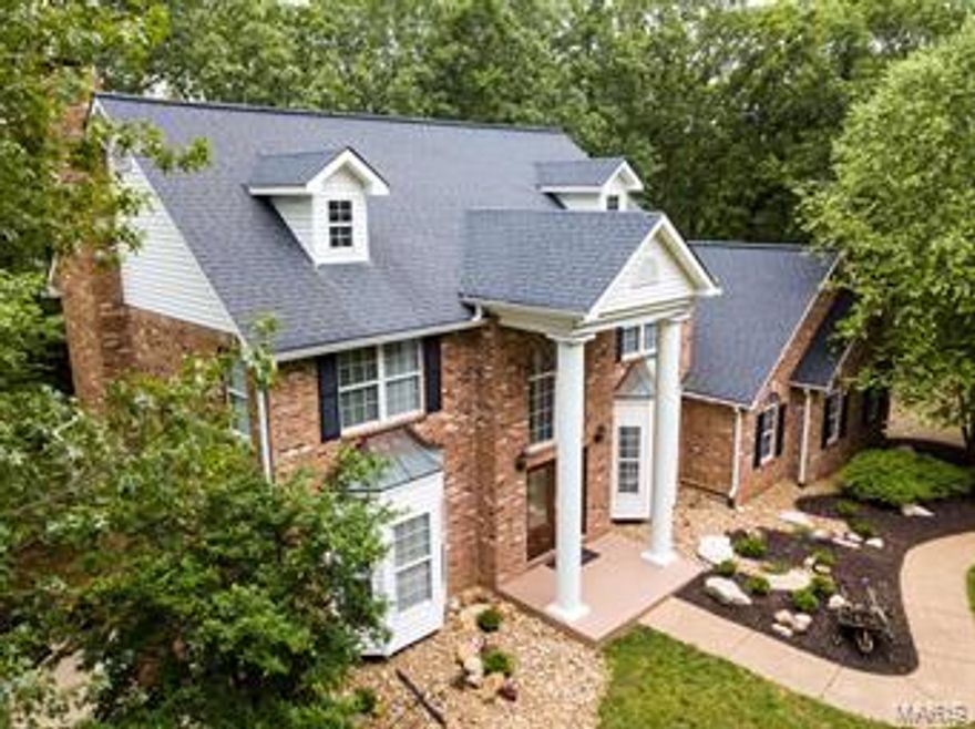 Wow! The buyer of this home now has the option to possibly attend Rockwood Schools (State Statute 167.125). Gorgeous custom 2 story brick home 4200+ sq ft & a guest house on 5.5 secluded park-like acres surrounded by 40+ wooded acres! Step through the mahogany doors into this 4 bdrm, 4 full bath home w 4 car over-sized garage, 2 full masonry fireplaces, custom cherry mantel, hickory floors & 2nd floor laundry. Fabulous gourmet custom kitchen w beautiful cherry cabinets, granite counter tops & breakfast bar, large walk-in pantry & stainless appliances. New custom master bath offers an elegant, huge walk-in shower & stunning double vanity. Lots of natural lighting, can lights & 9’ ceilings on the main/lower levels. Professionally finished walk-out lower level-10’ pour, sleeping area, full bath, media & rec room, 2nd laundry/utility room. Enjoy the wildlife & sunset off your beautiful composite deck surrounded by mature trees! Only minutes to St. Albans Country Club, Wildwood & Hwy 44. Suitable for Bed/Brk