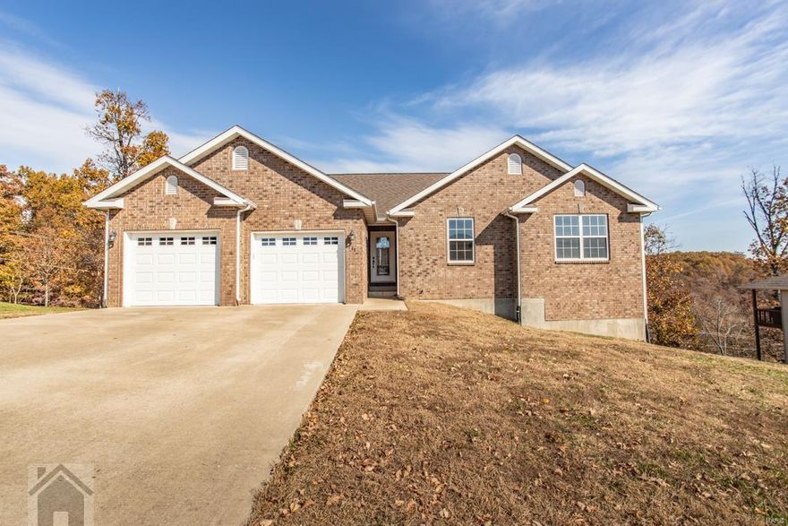 This is a beautiful 5 bedroom, 3 bath home located in the highly desirable Woodridge Subdivision at an amazing price. This home is full of updates you'll notice as soon as you walk in. Enjoy the wood flooring through the upstairs area, fireplace in the living room and a functional kitchen featuring stainless steel appliances, pantry, breakfast bar and tile floors for easy clean up. Off of the kitchen you will find two sizable bedrooms and a guest bathroom. Also upstairs is the main floor laundry area and a large master bedroom that has a vaulted ceilings, and walk in closets with a master bathroom suite featuring a jetted tub, separate shower, and his and her sinks. Theres more space to love downstairs in the massive family room area which is carpeted for comfort and features a second fireplace. Just down the hall are two more bedrooms and a full bath. This home has a huge unfinished storage area where you can store anything your heart desires! Schedule your showing today!