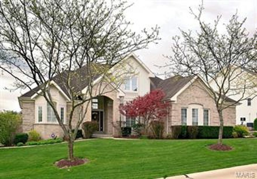 Wow! This is a spectacular 1.5 story w Atrium overlooking the golf course with over 4900sf of living space with finished Lower Level! Beautiful home with updates throughout including Hardwood flooring, wood blinds & plantation shutters, Viking & Bosh SS appliances. The two story entry welcomes you with awesome views from the back wall of windows. W main level master bedroom suite offer walk-in closet, separate jacuzzi tub & spacious shower w seat. Great room w fireplace & built in shelving, separate formal dining room. Spacious kitchen w all stainless, newer appliances, center island & breakfast bar open to breakfast room & Hearth room w gas fireplace. Upper level host two bedrooms each with their own walk in closets, dressing rooms and sharing a jack-n-jill bath w loft to lower level. The lower level offer the opportunity for in-law living w large family room & separate rec rm w doublesided gas fireplace.  Wet bar/kitchenette, perfect for entertaining & 2 more bdrms & bath.