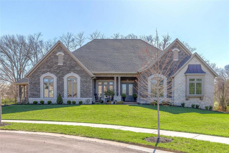 Exquisite brick & stone ranch home! Over 6375 sf of living space enhanced by the finest in craftsmanship & energy efficient systems throughout. Spacious open floor plan features sophisticated dining room, private study with French doors & stunning great room with 12’ box beam ceiling, marble fireplace & wall of windows. Designer kitchen with granite countertops, state-of-the-art appliances, 9’ x 5’ center island & butler’s pantry adjoins light-filled breakfast room & hearth room with floor-to-ceiling stone fireplace flanked by built-in bookcases. Sumptuous master bedroom suite with luxury bath with BainUltra tub & shower spa plus 2 generous-sized bedrooms with Jack n’ Jill bath complete the main floor living quarters. Walk-out Lower Level includes recreation room with wet bar, family room, office, workout room, 2 additional bedrooms & full bath. Professionally landscaped grounds with deck, patio & 3-car garage. Premier gated community with walking trails, ponds, fountain & waterfall. Additional Rooms: Mud Room