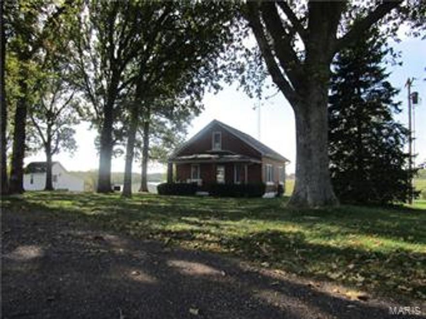 Mid Missouri Black Angus Cattle Farm, with a Brick Bungalow. You won't find a cleaner farm/home/out buildings than this!  120 acre farm has been in the same family since 1908, and the love and devotion is evident. This "tiny home" was built before "tiny home's" were popular, with 3 bedroom, 1.5 bath, main floor laundry, and an abundance of well placed sun light through the many windows.  Land is almost fully fenced, and cross fenced, features a stocked 1+ acre lake with dock (dam does have a leak), pasture and woods are about 50/50. 6 rotational pastures. I counted 8 out buildings, including the old original home (used as a heated office w/half bath), chicken house, gator garage, large Quonset building, 4 car garage w/concrete floor, one large metal shop building w/ concrete floor and heat, one large open metal building, and the old one car garage...All buildings have Electric. Electric is also ran to the many automatic waters throughout the farm. Don't wait too long to fall in love...