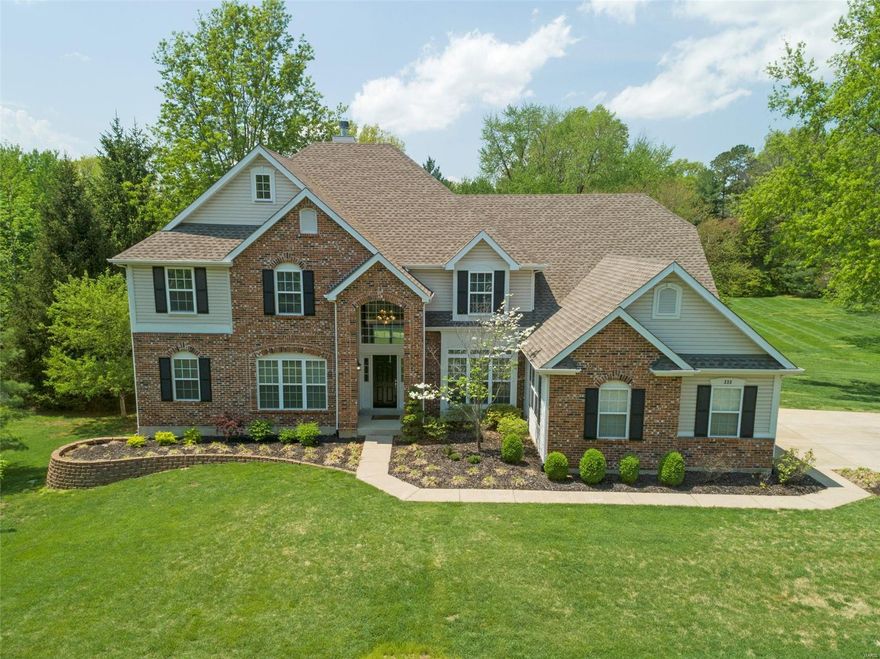 With over 5000 sqft and a finished LL that could be a mother-in-law suite, this home is a great buy at $158 per sqft. The house is situated on a private 1 ACRE park-like lot in a tree canopied subdvn. Main flr master features a renovated bath. Kids and guests enjoy private baths w/ 2 en-suite baths and a 3rd full bath on the upper level.4th bdrm upstairs could be converted to a sitting area. The breakfast & hearth rooms offer a bank of windows w/ great views of the evening sunset. The expanded kitchen is HUGE w/lots & lots of cabinets and granite counter-space. Home feels even more spacious w/ the soaring vaulted ceiling on the main floor, the 2 stry great room & entry foyer.Extras include: media room, surround sound system, central vacuum system & 2 wet bars. Award winning Parkway Schools & top private schools. Location is prime w/ proximity to 4 major hospitals and 15 mins from the airport.Mins from Bellerive Country Club.