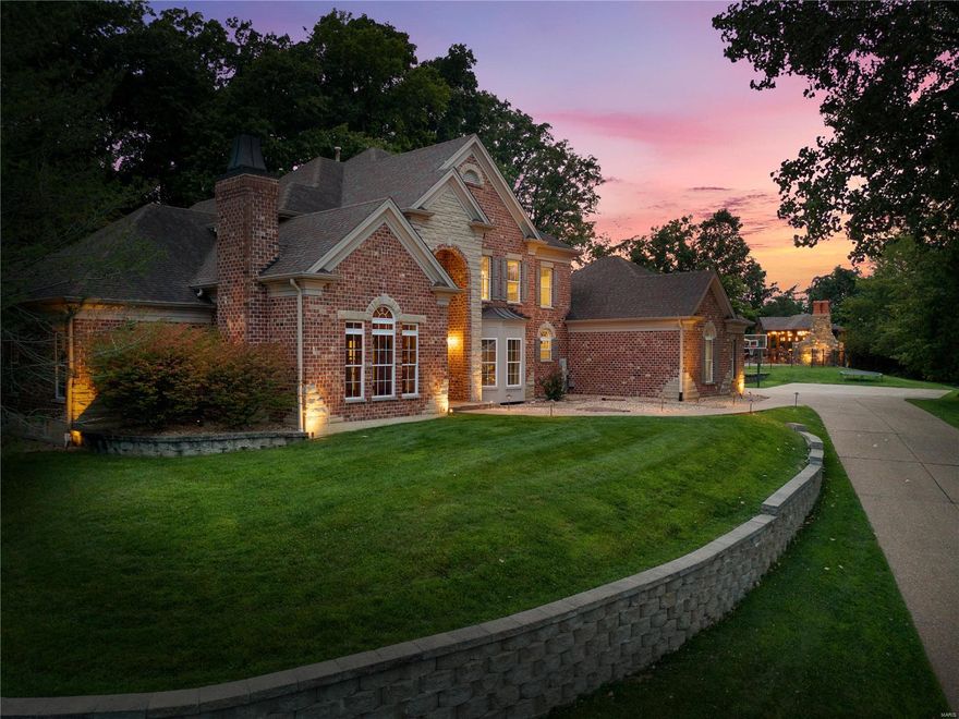 Nestled on over an acre this luxurious 1.5 story 6 bdrm 7 bath home offers a resort-like experience. Spanning more than 7500 sq ft of living space designed to provide comfort making it a perfect retreat. The outdoor space is a true sanctuary featuring a stone patio, custom pool with waterfall and outdoor pavilion equipped for al fresco dining and entertainment. Three outdoor fireplaces are strategically placed on the property, providing cozy spots to gather on cooler evenings. For sports enthusiasts, a practice turf soccer field is ideal for honing skills. Upon entering the home you're greeted by a grand foyer that sets the tone for the rest of the interior. The main floor has undergone a renovation emphasizing modern elegance and state of the art amenities. The new chef's kitchen is outfitted with sub zero and wolf appliances, custom cabinetry and large center island. The two story living room is a showstopper. This home is a must see to believe!