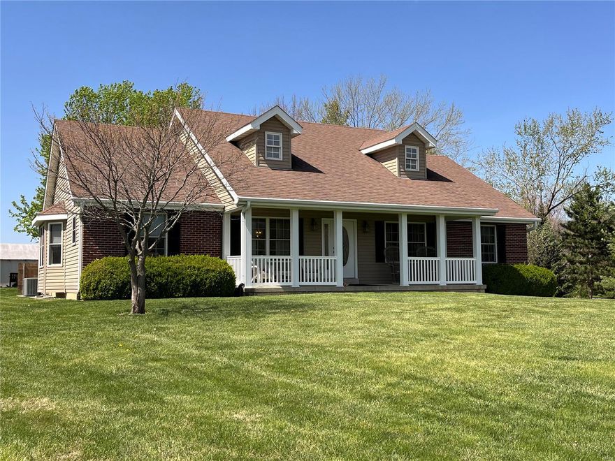 48+/- acre estate offers open fields, wooded wildlife habitat, & improvements for everyone. Custom ranch home built by Hackmann Contruction offers 2300sqf.t, 3 bed, 2 bath, country kitchen w/all appliances, living room, 4 season room, laundry & full unfinished basement. Covered front porch, large concrete patio overlooking the flower beds. The carriage house offers 845sq.ft. living quarters w/living room, kitchen/dining, bedroom & full bath, 3 car oversized garage. Horse barn w/4 stalls, tack room, hay storage, water hydrant & electric. Hay shed w/approx. 90 round bale capacity. Chicken coop & garden shed w/concrete floor w/lean to. 3 bay storage building & 2 livestock loafing sheds. 20+/- acres in hay(brome/fescue) & 12+/- acres wooded w/abundant wildlife. 3 fenced paddocks, all woven wire w/central automatic drink, large garden area & numerous species of trees & a 3.5 acre m/l stocked lake. No known restrictions. Bring the family & friends, livestock, & make generational memories!