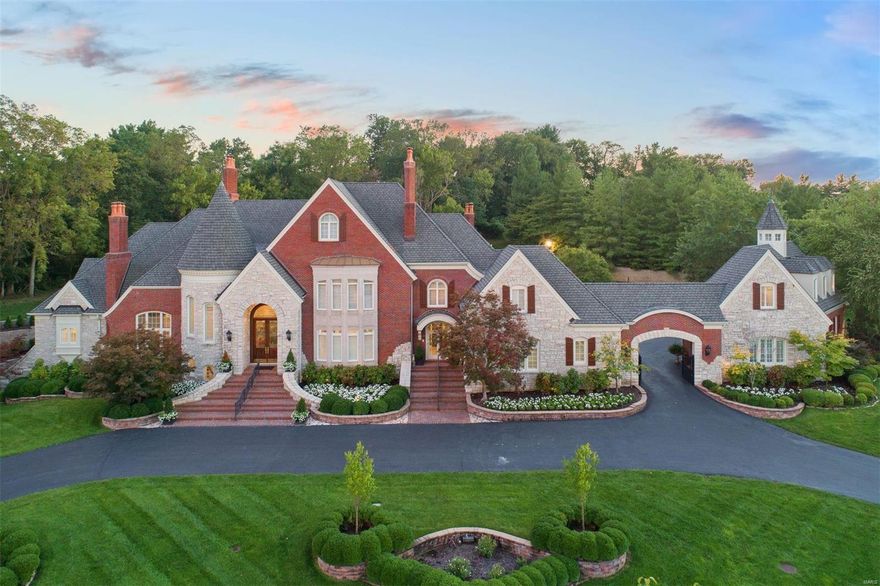 4 Lochinvar Drive is the embodiment of a life well lived! Beautifully situated on nearly 2 acres, you will be in awe from the moment you arrive. Generously sized gracious living - with 7 bedrooms, 6 full and 2 half baths in the main house, plus a separate carriage house apartment and pool house. An exceptional blend of classic details, chic finishes and fixtures, and an incredibly functional/liveable floorplan. With equally inviting formal and informal spaces, family and friends will flock - and you better like company, because they may never want to leave! Unrivaled amenities include a Sommelier-worthy 2000 bottle wine cellar, turf putting green, tennis court, pool with sun shelf, and lower level athlete’s playground. First-floor master suite with fireplace, beautifully appointed marble bath, and private screened porch for relaxing. The Porte Cochere connects oversized show-ready 2 and 4 car garages. Truly a once in a lifetime offering on this esteemed gated lane in Town and Country. Additional Rooms: Mud Room, Wine Cellar