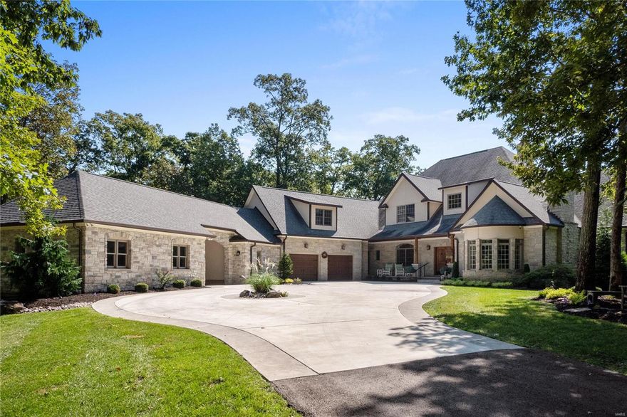 Sprawling 42-acre estate w/ total privacy! Outdoors boasts a 4-acre private lake, 5 car garage, barn/storage area, inground pool, hot tub & a covered area w/ wood burning fireplace, TV & built-in BBQ area. Numerous custom amenities throughout! 2 story entry w/ curved staircase. Large dining rm, perfect for family gatherings & a study/den w/ a fireplace off the ML. Gourmet kitchen w/ slate floors, granite countertops, custom cabinets, center island w/ breakfast bar, gas cooktop, built-in refrigerator, double ovens & adjoins the breakfast rm w/ a beamed ceiling. 2 story great rm w/ built-ins, stone surround fireplace & access to the deck. Spacious master suite w/ updated bath & large changing area w/ his & hers walk-in closets! 3 large UL bedrms, 2 full baths, & a bonus rm. Finished walkout LL w/ game rm, rec rm, 2 full baths, exercise/bedrm, & built-in wet bar for entertaining. Addtl features include an elevator, circle driveway, gated entrance, & so much more! Absolutely breathtaking!