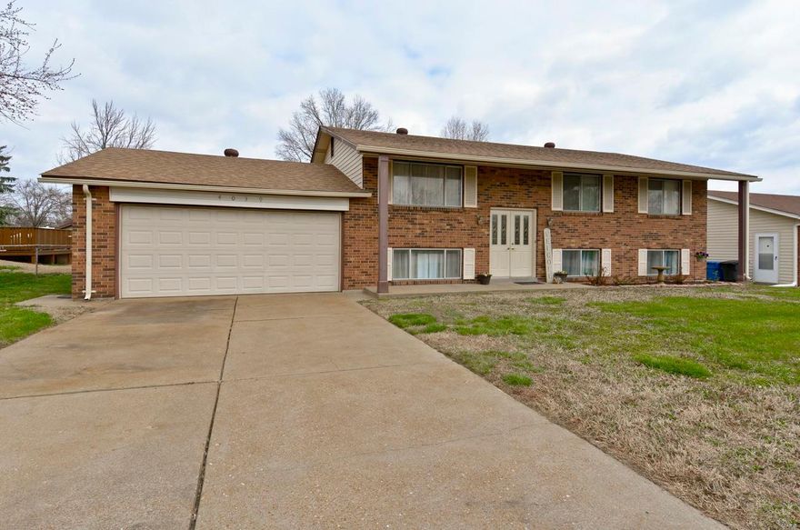 Welcome Home to 4039 Avery Lane! This 4 bed 2 bath is a house that anyone would be proud to call Home! From the minute you enter the door in this open floor plan the generous amount of living space will be apparent. Upstairs the living room, dining room & kitchen will be the hub of your daily living. Freshly painted with neutral paint the natural light fills this space. A traditional hall layout consists of the master bedroom w/ direct access to the hall bath, & 2 additional bedrooms. The lower level features a generous sized 4th bedroom, full bath & family room w/sliding doors to the backyard patio. Your St. Louis summers will be spent relaxing on the large 2 tier deck & cooling off in the backyard pool. A fenced backyard is a highlight that will be enjoyed spring, summer & fall. 2 car oversized garage! Pride of ownership shine thru out this wonderful home in a great location. Close to community center, park, fire & police stations & extra bonus of being on the July 4th parade route.