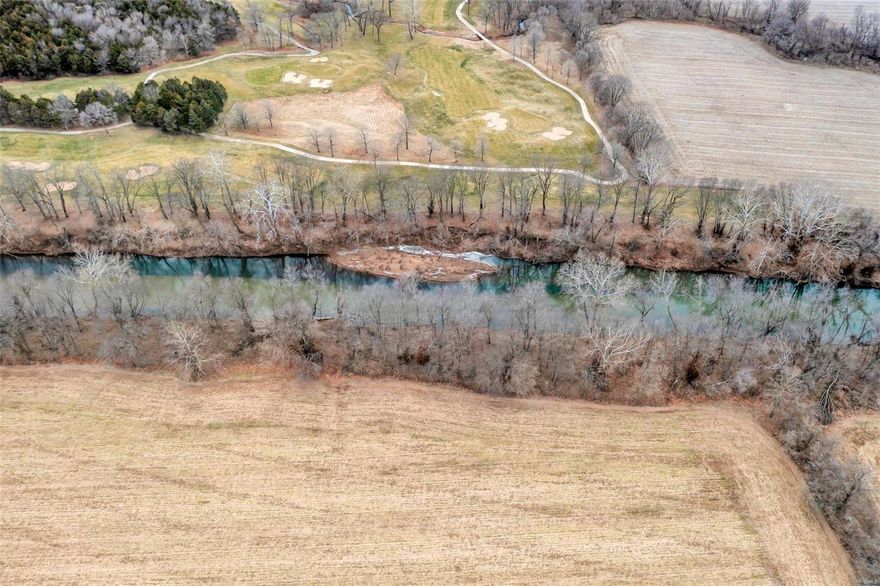 Welcome to this +-131 acre farm / homestead just 25 minutes from St. Louis. Featuring 75 tillable acres & almost 60 wooded  acres, nearly 1000 ft of Big River frontage w/ boat launch, & motocross track.... there is something for everyone in the family! With the 75 acres being in the river bottoms & leased to a local farmer, the land is home to many monster deer & turkey! There are multiple barns, a chicken coupe, a hog house and machine sheds. The 60 acre portion of the property is mostly fenced for livestock. The cute traditional farmhouse is a 1.5 story w/ covered front porch, 9ft ceilings on the main floor, large family & master bedrooms, separate dining area w/ seating space for 10, kitchen w/ stainless appliances & breakfast bar is a step back in time w/ modern touches. There are 2 large bedrooms in the upper level. Both traditional & wood burning furnaces heat while forced central AC cools the nearly 2000 square feet of comfortable living space.  A once in a lifetime opportunity! Additional Rooms: Mud Room