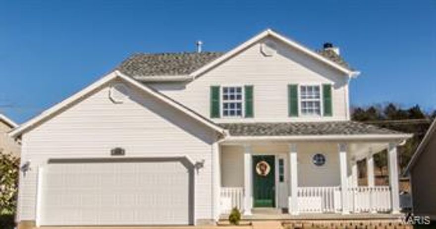 Welcome home to this Gorgeous 2 Story home. You will fall in love the minute you walk in from the covered wrap around porch! The Gleaming floors, Bay Windows, Updated Fans/Lighting make it a stand out.  Tons of natural lighting and open floor plan make this home feel very inviting. Cozy up in the evenings next to the wood burning fireplace. Great eat in kitchen that flows nicely to the large patio area and level backyard. The Shed offers electricity for those extra projects! Invisible fencing along with collar stay with the home purchase. Upper level offers 3 very spacious bedrooms along with 2 full baths. The Master Suite offers double closets, Bay Window, Large bath with great vanity area. Lower level is just waiting for your finishing touches. The garage is completely dry-walled and nicely finished, including the ceiling! Newer Roof!  All of this and sits on a quiet cul-de-sac.