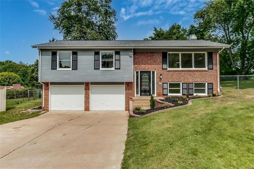 Meticulously updated 3-bedroom 3-bathroom split foyer home in the heart of St. Charles!  This home offers beautiful hardwood flooring throughout the main level, updated lighting and fresh paint throughout!  The spacious living room is full of natural lighting.  The kitchen features stainless steel appliances, granite countertops and ceramic flooring.  The family room in the lower level features a wood burning fireplace and new laminate flooring.  The large fenced-in back yard features a large sundeck which comes complete with a gas burning firepit!  Other features include a newer HVAC system, newer architecturally shingled roof. Located near schools, parks and historic St. Charles, this one wont last long!