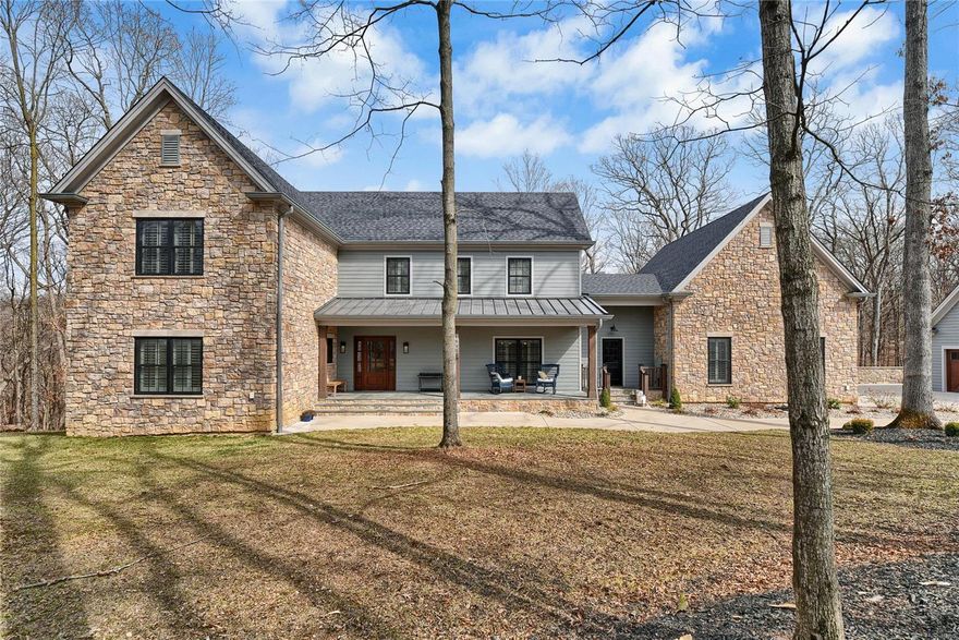 This 3 year old home lacks nothing, beautifully appointed in every way with attention top to bottom! French Country design with easy flow including shiplap in vaulted wood beamed ceiling great room. All this area leads out to big screened porch, deck, and lovely woods getting ready to bloom w dogwoods and redbuds, superbly private lot! Gorgeous premium plank flooring through out this fine custom home featuring 3 fireplaces, gourmet cooks dream kitchen including huge center island perfect for entertaining! We have a formal dining room, also main floor exquisite master bedroom w fireplace leads to deck and incredible views.. upstairs features 2 more bedrooms, , office and library/ sitting room with barn doors and premium flooring, no carpet in this home!  Fully finished downstairs with 2 more bedrooms, media room, exercise room, with perfect space for guests..  This home is perfectly positioned between 4 State parks for days of hiking, biking or just plain peace. Min to I-44! Premium lot Additional Rooms: Mud Room