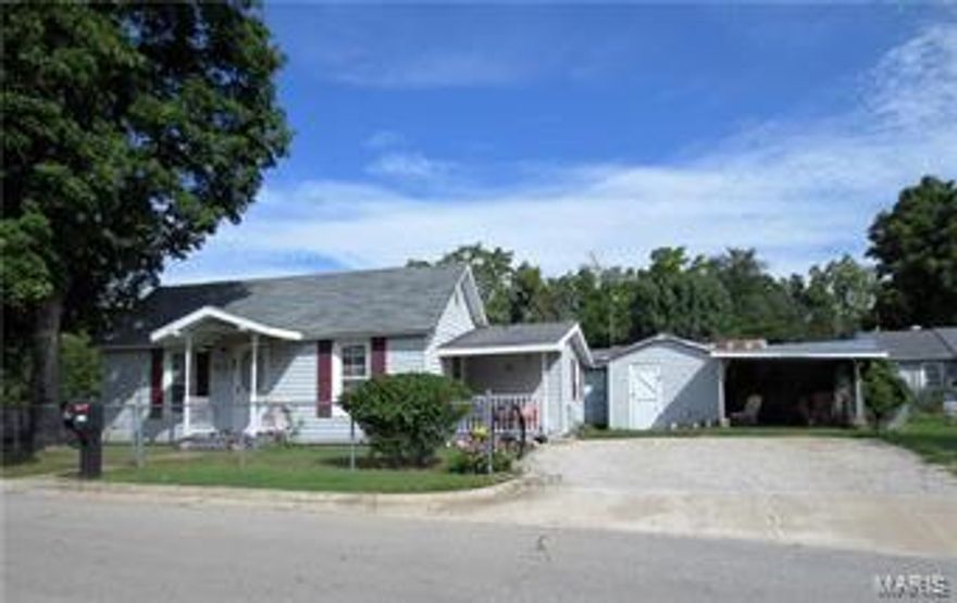 Charming 2-bedroom home with lots of updates!  Home is basically a 1-owner and very well maintained!  It features newer vinyl siding, double pane windows, nice Oak kitchen cabinets, a covered porch and a large fenced-in lot with a small workshop, carport and utility shed!  REDUCED!