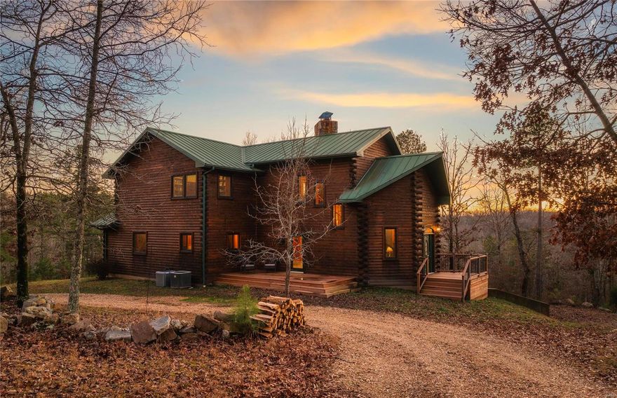 This turnkey hunting property is conveniently located between Doniphan and Poplar Bluff, along Ripley BB-2. This property consists of food plots, shooting houses, a pond, fruit tree orchard and a year round creek. The mix of food, water, and bedding area this property has attracts the abundant amount of wildlife in the area. The long, gated driveway in takes you to the stunning custom lodge and provides the ultimate privacy that the ozarks have to offer. The lodge includes hickory cabinets, tons of custom wood finishes, big beautiful views, and a one of a kind wood burning fireplace. The fireplace extends down to the basement, where you will find a second kitchen and a concrete vault/safe room. The concrete vault/safe room is the perfect place to store all your valuables and makes for a great tornado/storm shelter. A metal shop and second well are next to the fruit tree orchard adding additional storage for all your tools and equipment. Call today to schedule your own private tour.