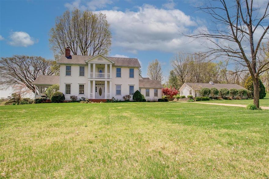 Situated on over 40 gorgeous acres, this spectacular estate offers endless amenities. The perfect retreat to enjoy the country or make your permanent residence in the Washington School district. Featuring a main floor master suite, this  5000+ square ft. home also includes an additional 750 sq/ft loft above the 3 car garage and a 1248 sq/ft outbuilding which is perfect for your storage needs, workshop or barn. Enjoy fishing at the 1 acre lake a short walk across the property. This custom home features beautiful hardwood floors throughout most of the home, custom millwork & built in shelving, zoned HVAC and a main floor laundry room.  The finished lower level offers a rec room & wet bar. Relax and enjoy the beautiful views from the fabulous sunroom just off of the kitchen. The home was built in 1998 with some of the 1800's features from the original home such as the staircase banisters/railings & exposed stone foundation. A fabulous estate in a great location on over 40 acres! Additional Rooms: Sun Room