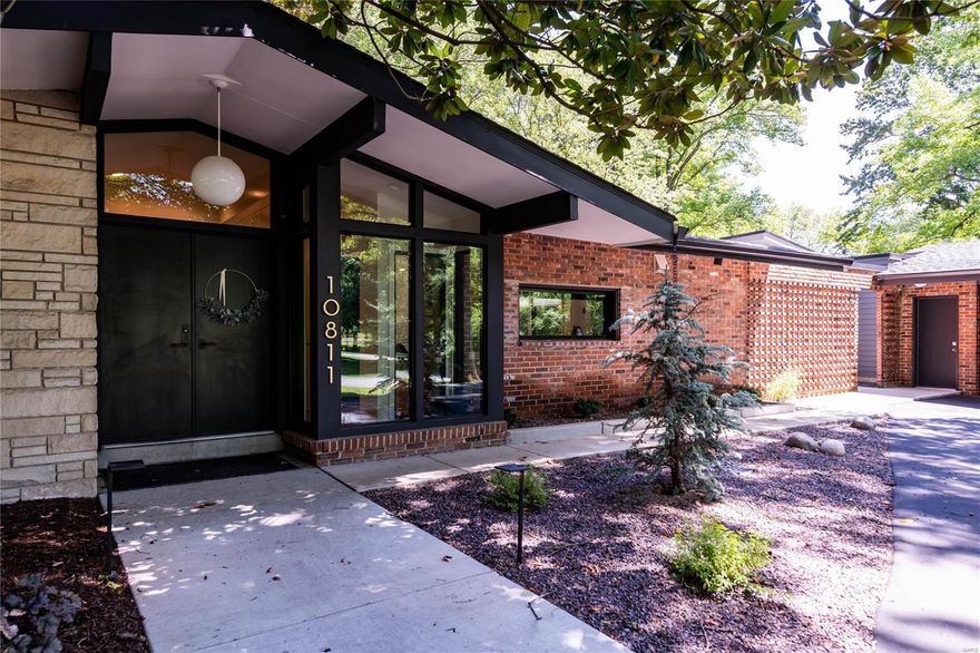 A complete renovation in 2019 turned this home into a contemporary masterpiece. Ladue School District - walk to Spoede Elementary. Vaulted front entry leads to sophisticated living & dining rooms with soaring ceilings & woodburning fireplace. Hardwood floors throughout the home. Expansive windows and sliding glass door that opens to a private patio. Open kitchen features large island, quartz counters, custom Beck Allen cabinets, Sub Zero refrigerator, wine fridge & Miele built-in coffee maker. Wolf induction cooktop, microwave, convection oven & steam oven. Main bedroom suite with double closets, custom shades & ensuite bath. 3 additional bedrooms & full hall bath complete the main floor living quarters. Finished lower level with recreation room, bedroom & full bath. New addition that is used as an art studio or can be a guest room with a full bath. 2-car garage with east and west entrances. Mud room & laundry room. 1+ acre level lot. Irrigation system & exterior lighting. Additional Rooms: Mud Room