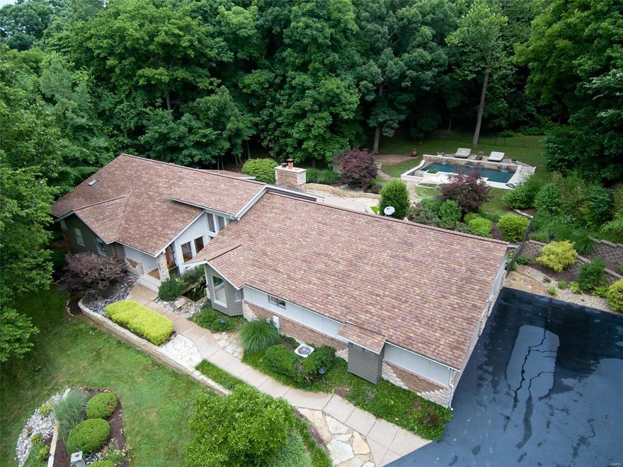 Uniquely Exquisite! One of a kind home and opportunity on 3.63 acres.  There are 5 bedrooms & 5 1/2 baths. 3car oversized garage, salt water vanishing edge pool, main floor laundry, sprinkler system with container watering system, invisible fencing for your pets. Roof replaced in 2015, furnace & A/C-2016. James Hardie siding all around, 1300sf of PVC Decking. Hot tub, Hideaway room, Private entrance to a LL in Laws suite. Replaced driveway, kitchen, bathrooms, lighting, new space closets, wine cellar open stairway to the LL family room.  Security cameras  and monitor.  All appliances stay , pool table included.  There is a central vac system, landscaping lights, built in speakers inside and on the deck & pool area. Don't miss seeing this spectacular home. A complete Package you could move right in! Additional Rooms: Wine Cellar