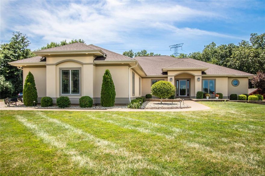 Gorgeous great rm ranch on 3 private acres, culdesac lot, 4 car garage. Plus one of the nicest yards in St. Louis - stunning pool, patio, outdoor kitchen- top of the line appliances, custom pavilion, 12 person hot tub & fireplace ~ your own 'vacation spot'. Fantastic upgrades throughout ~ 11’ ceilings, extensive millwork & integrated sound system. Impressive hardwood foyer leads to formal dining room & stunning great room-stacked stone fireplace flanked by lighted display cases & sliding glass door that opens to expansive deck. Chef’s kitchen with quartz countertops, custom 42” white cabinetry, premium stainless steel appliances, center island & butler’s pantry adjoins vaulted breakfast room & light-filled gathering room. Coffered master bedroom suite offers a relaxing oasis with a large walk-in closet, luxury bath & access to deck. Plus 3 additional bedrms, sitting rm & 2 full baths on the main. Finished walk out lower level - billiard area, game space, bar, full bath & 5th bedroom. Additional Rooms: Mud Room