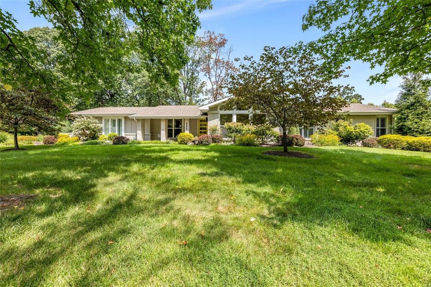 Outstanding 5-bedroom, 4.5-bathroom sprawling ranch on an acre lot in Frontenac.  This freshly updated home features over 4400 sq ft of living space.  The center entry hall entry opens to a formal living room w/ faulted ceilings, stone fireplace and beautiful wall of windows and the formal dining room.  The updated kitchen features custom cabinetry, designer appliances, stunning stone countertops and huge center island that opens to the great room with more vaulted ceilings, 2nd fireplace and a 2nd dining area.  The primary suite features a large bathroom w/ double vanity and tub with separate shower and large walk-in closet w/ custom built ins. The other wing of the house features 3-more bedrooms, 2-full updated bathrooms and main floor laundry area. All of this, plus another flex-room that is perfect for a home office or guest suite with a 4th full bath right next to it. The lower level provides even more finished space with a walk out, huge rec-room and bar area.