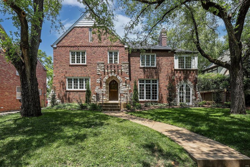 Charming 2-Story English Tudor home nestled on plush landscaped lot in the desirable Davis Place neighborhood – Top Rated Clayton Schools. From the minute you drive up to this house, you will see pride and ownership. This 3 Bedroom, 3.5 Bath home boasts a bright and open floorplan, has significant updates, made by its current owner, and 3,716 square feet of living space, including the awesome finished Lower Level. When you walk through the handcrafted front door, into the Entry Foyer, you will know you are home. Highlights: newer roof and gutter guards (2022), newer sewer lateral (2022), newer driveway (2021), newer roof insulation (2021), a tremendous amount of newer Pella windows (2020), 2-car detached garage, and as a bonus - a charming playhouse with newer roof (2022) ceiling fan, built-in bookcases, tongue and groove paneling, laminate flooring and shake roof which could be used as a studio or potting shed. Relax outside on the rear deck, and enjoy your charming, level backyard! Additional Rooms: Sun Room