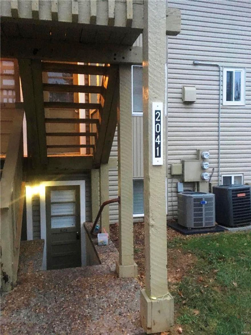 Move in ready 2 Bedroom condo with new paint, recent Frieze carpet and new energy efficient HVAC system.  Beautiful wood laminate flooring in main Living area and hallway, tile in kitchen / dining and bathroom.  Very nice blinds on all windows.  Stack washer and dryer stays and ceiling fans and LED lights throughout also stay.   All exterior maintenance, water and sewer included in monthly Assoc fee plus access to condo pool, clubhouse and community washer/dryers.  In addition, residents of Mystic Village enjoy full Lake St Louis Community Association amenities including access to both lakes, LSLCA clubhouse access, clubhouse competition pools, golf course access to both LSLCA executive course and Lake Forest Country Club, tennis courts and parks throughout the community.  Lake St Louis Community Association membership is required and cost $600 per year in addition to the Mystic Village Monthly Association fees. Location: End Unit, Ground Level