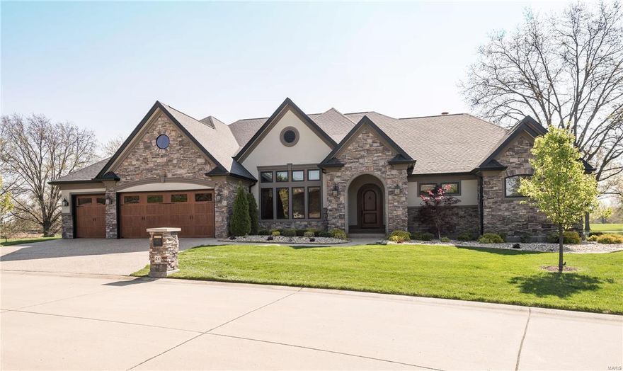 Amazing quality & attention to detail thru/out this custom Schaeffer home, w/ 2 screened in porches positioned to take in the panoramic lake & golf views of Bogey Hills CC. Soaring ceilings w/multi piece crown to the 7” base, dramatic floor to ceiling stone fireplace, custom built-ins, stunning great room w/wall of custom Pella windows is entertainers delight.  Chef's kitchen w/staggered cabinetry, sprawling granite counters w/leather look & premier appliances compliment the incredible kitchen. Elegant study boasting custom built-ins & box beam ceiling brings outdoors in w/wall of windows & 2nd study/optional bedroom. Retreat to master w/his & her sinks, soaker tub, w/in glass block shower & expansive closet. Dramatic stone wall & wrought iron spindles invite you to entertain in LL  w/style.  Embossed leather wet bar, expansive 2 Rec areas, bed & bath. Privacy fenced yard w/sprinkler & beautiful paver patio w/ firepit brings entertaining out.  Over 1.3 million invested!!  A must see!