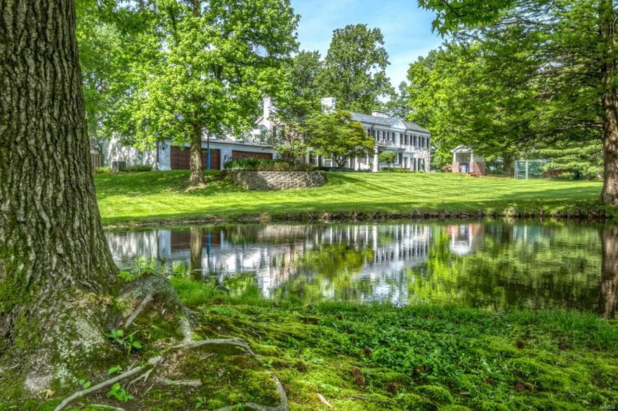 "Fantastic New Price!  $200,000 Price Adjustment" This elegant estate sits on over 5 acres of a gated community and features a Gale Henderson custom residence, salt water pool, bath house, lake and horse stable. Georgian colonial style is captured throughout with plaster moldings, built-in bookshelves and brass hardware. Expansive windows and sun rooms provide wonderful garden vistas.  The newer kitchen is a chef’s dream with a center island, breakfast room and butler’s pantry. Additionally, there are formal living and dining rooms, a family room, 2 sun rooms and 2 fireplaces on the first floor. Upstairs are a master suite w/ study, 3 large guest bedrooms, a dressing room, 3 baths and a wonderful porch. There is a finished LL and an oversized 4-car garage.  Walkways lead you to special nooks, crannies and established gardens throughout the property. A bath house accompanies the salt water Pebble Tec pool and spa and an artesian well supplies the irrigation system.Property is divisible. Additional Rooms: Sun Room