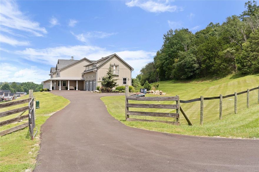 Be blown away by cathedral ceilings clad in reclaimed wood, hand-hewn beams, and 2+ story stone fireplace. Gourmet kitchen has a 10 ft. butcher block island, handmade cabinets, marble countertops, commercial grade appliances, and walk in pantry. Hearth room has a theater surround, stone fireplace, & full custom bar with bar top. French doors lead to a covered patio, with a 3rd stone fireplace and recessed lights, perfect for outdoor gathering. Main floor primary is heavenly with a steam shower, massaging tub, dual vanities, private commode, and 2 walk-in closets. Incredible dining space, office, 2nd full bath, laundry, and mud room make it main level living at its finest. Upstairs, 4 sizeable bds. 2 ba and a family room & 2nd covered deck make it great for kids. Separate apartment atop the finely finished 3 car garage can easily be connected to the main house and is perfect for hobbiests and enthusiasts alike. Room for a pool all nestled on 2 acres in sunny Eureka. Additional Rooms: Mud Room
