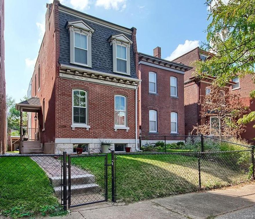 Classic St. Louis historic home and fully renovated is now available for rent! Welcome to this cozy home that includes everything: from charm and ambiance of exposed brick walls and original hardwood flooring to fully updated in popular modern style kitchen and baths. The main level is finished in soft tones, features open floor plan with 10 ft ceiling, recessed lighting throughout and upgraded light fixtures. Spacious kitchen boasts 42" white cabinets, granite countertops, custom backsplash, center island with breakfast bar and all stainless steel appliances. Upstairs offers a spacious master suite with updated luxury master bath and a walkout to your private deck. 2 additional bedrooms with features exposed brick walls, 2nd full bath and 2nd floor laundry. Fully fenced in yard, 2 huge decks and a 2 space carport with a garage door. Minutes from Blues City Deli, Hodaks, Sidney Cafe, Fraziers and Downtown Business District! 13 mo. lease min.